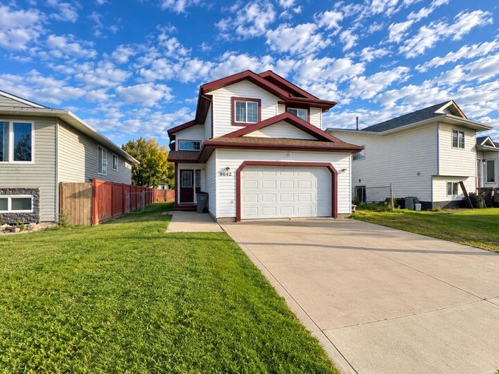 Property Photo:  9042 103 Avenue  AB T8X 1H3 