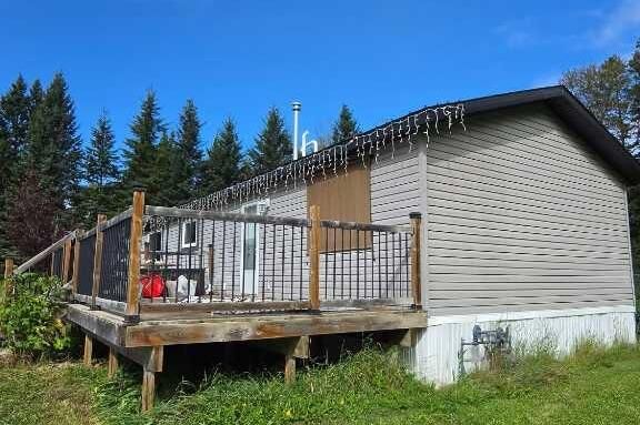 Property Photo:  401077 Range Road 64  AB T4T 1V5 