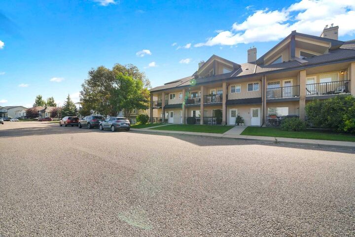 Property Photo:  89 Sunrise Way SW 7  AB T1B 4X9 
