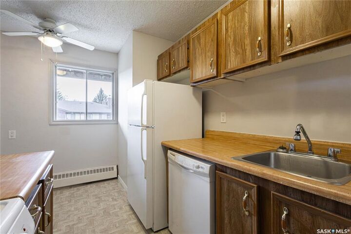 Property Photo:  35 Alport Crescent 206  SK S4R 7X2 