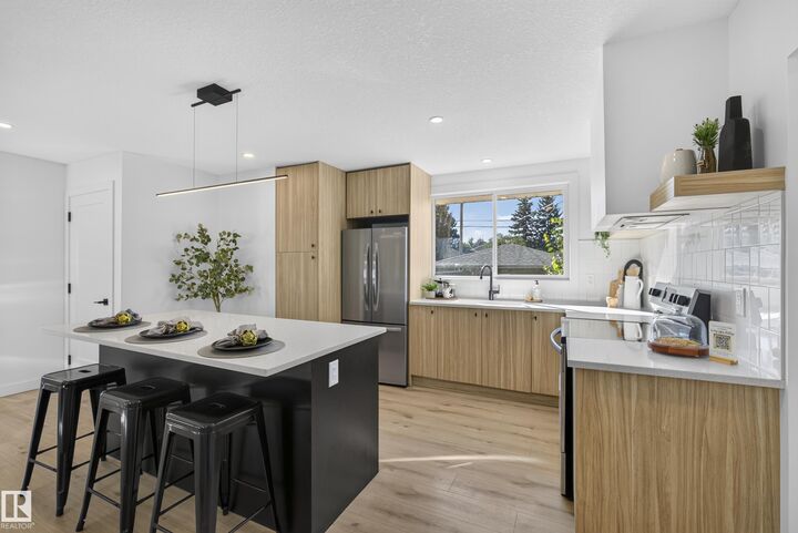 Property Photo:  11411 Malmo Road NW  AB T6H 4M3 