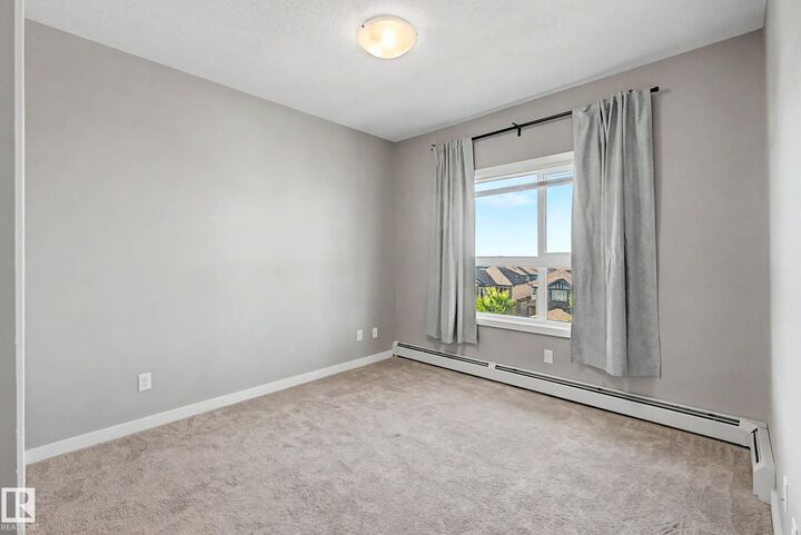 Property Photo:  5504 Schonsee Drive NW 437  AB T5Z 0N9 
