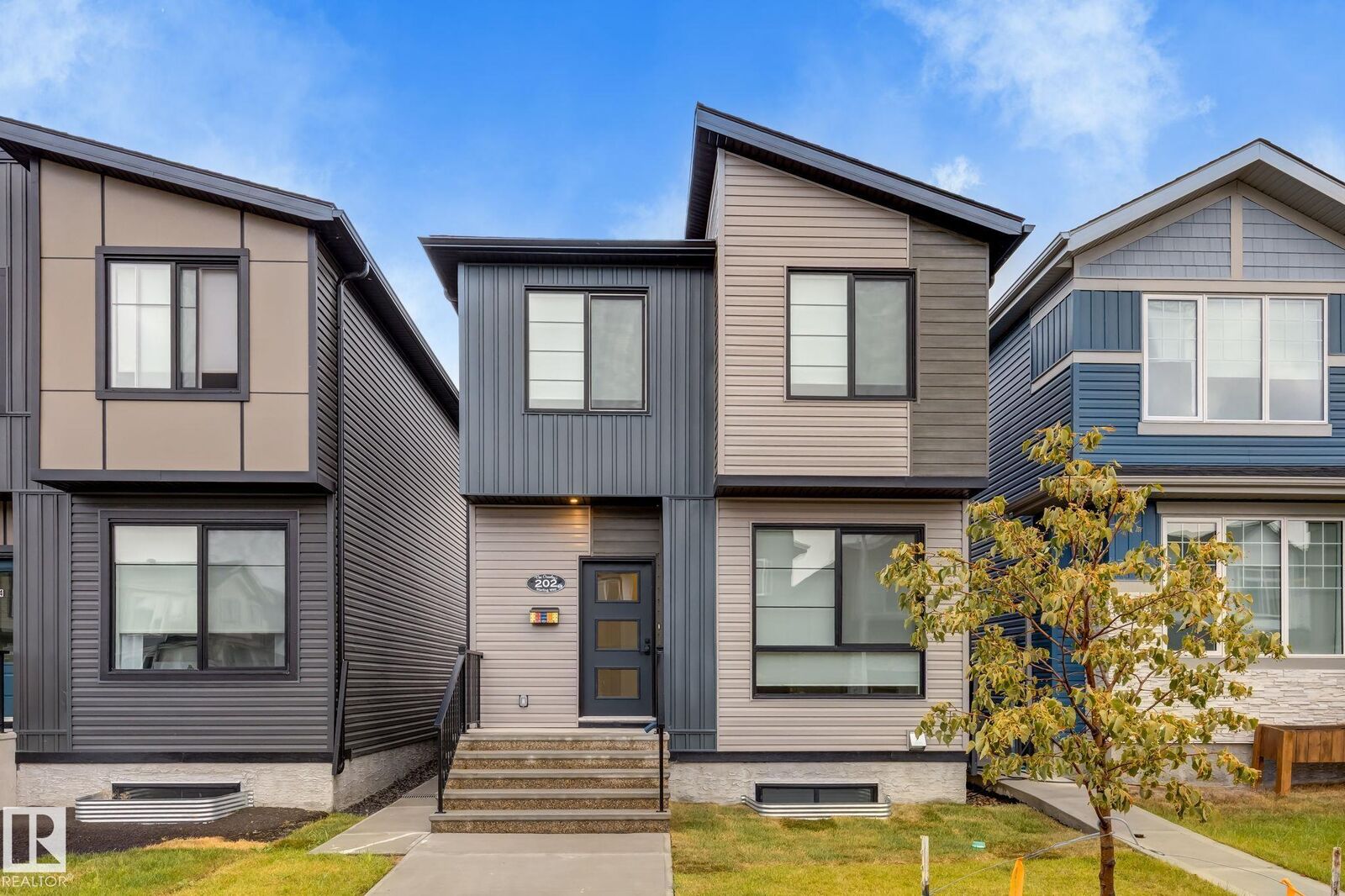 Property Photo:  202 Starling Way  AB T8L 0X9 