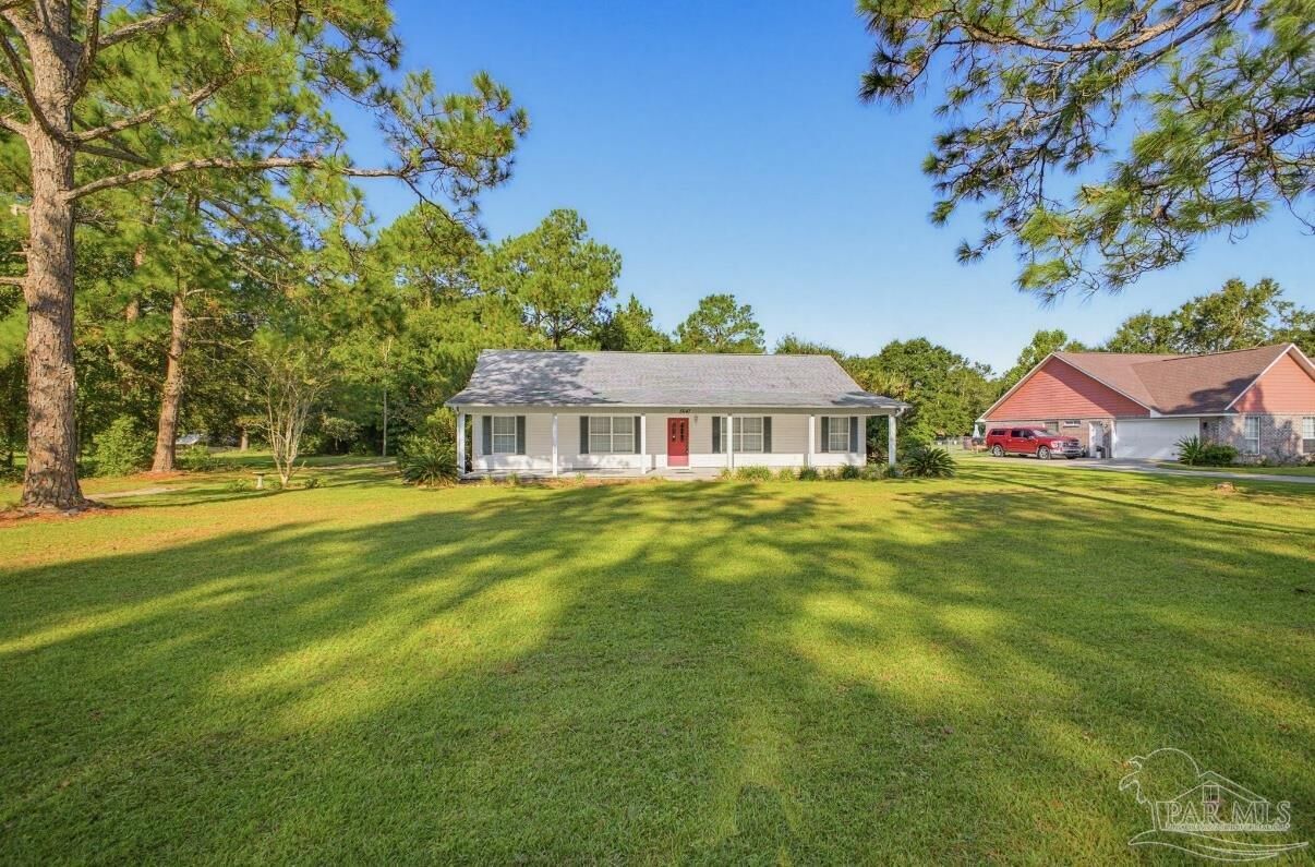 Property Photo:  5647 Tilubo Ln  FL 32571 