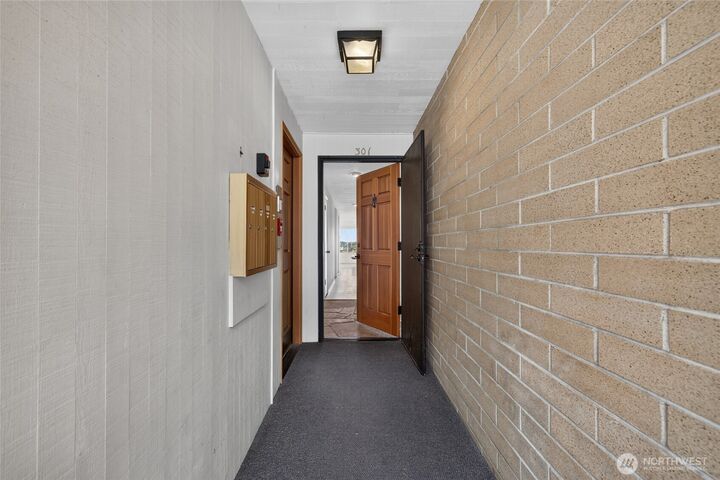 Property Photo:  3608  26th Place W 301  WA 98199 