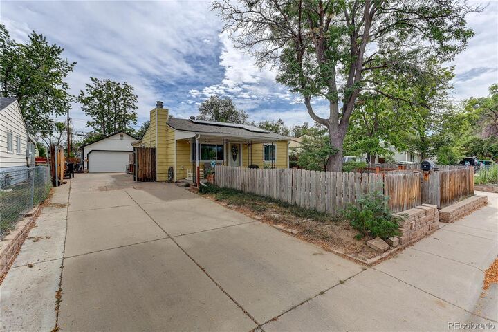 Property Photo:  7880 Olive Street  CO 80022 