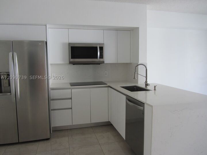 Property Photo: 5077 NW 7th St Ph12 FL 33126