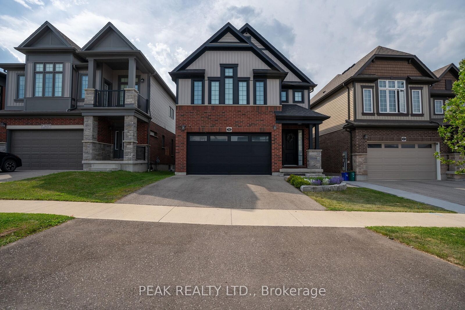 Property Photo:  311 Chokecherry Crescent  ON N2V 0H1 