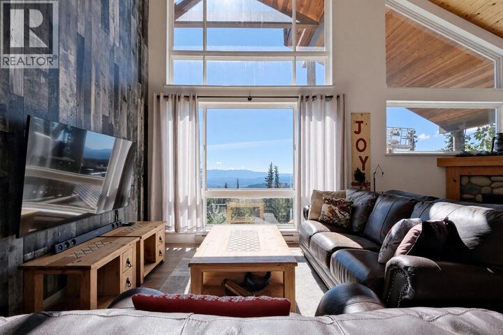 Property Photo:  5877 Snow Pines Crescent C  BC V1W 2L8 