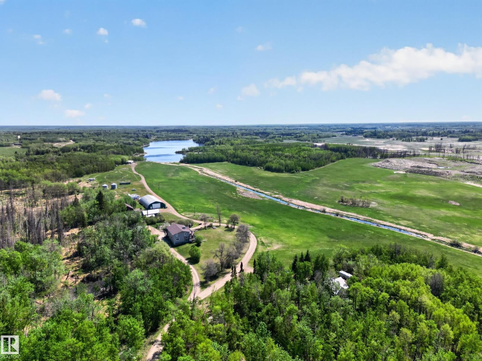 Property Photo:  52073 Hwy 21  AB T8B 1J4 