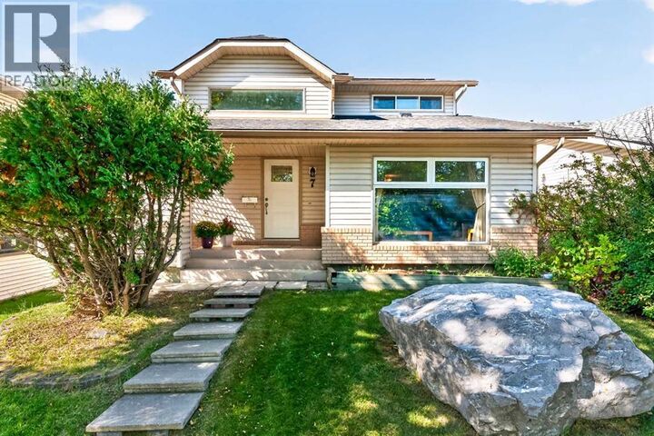 Property Photo:  7 Woodbrook Way Southwest  AB T2W 4J7 