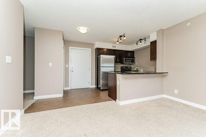 Property Photo:  11804 22 Avenue SW 405  AB T6W 2A2 