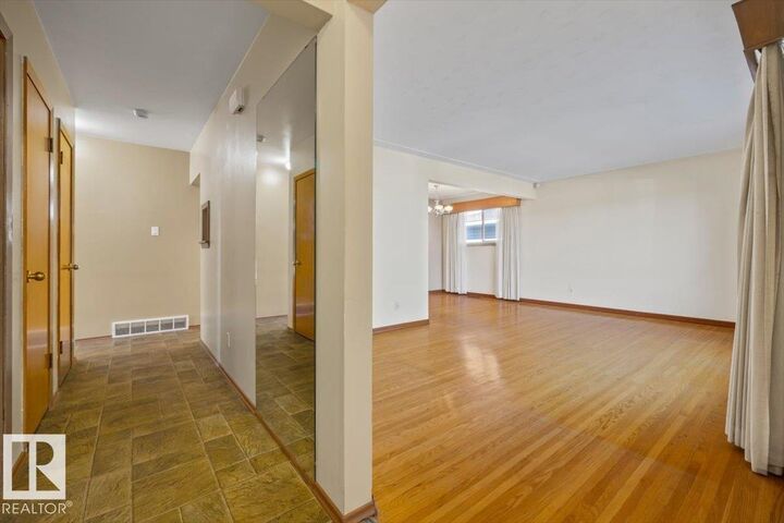Property Photo:  6003 95 Avenue NW  AB T6B 1A4 