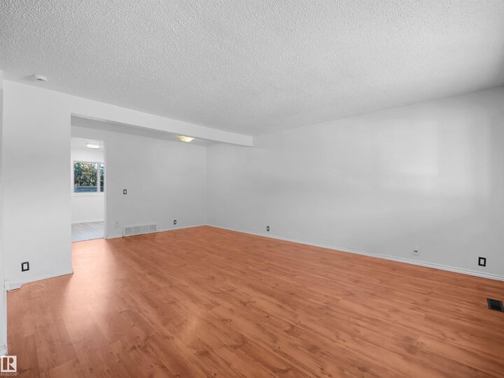 Property Photo:  13833 30 Street NW 22  AB T5Y 2B2 