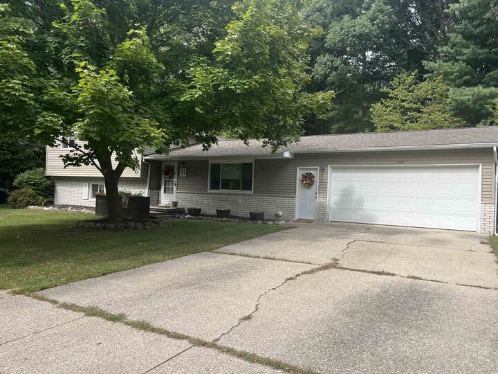 Property Photo:  1200 Sylvan Lane  MI 48640 