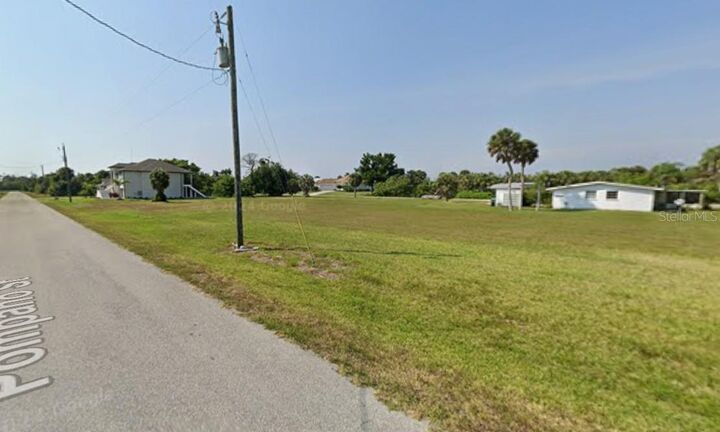 Property Photo: 120 Pompano Street FL 33946