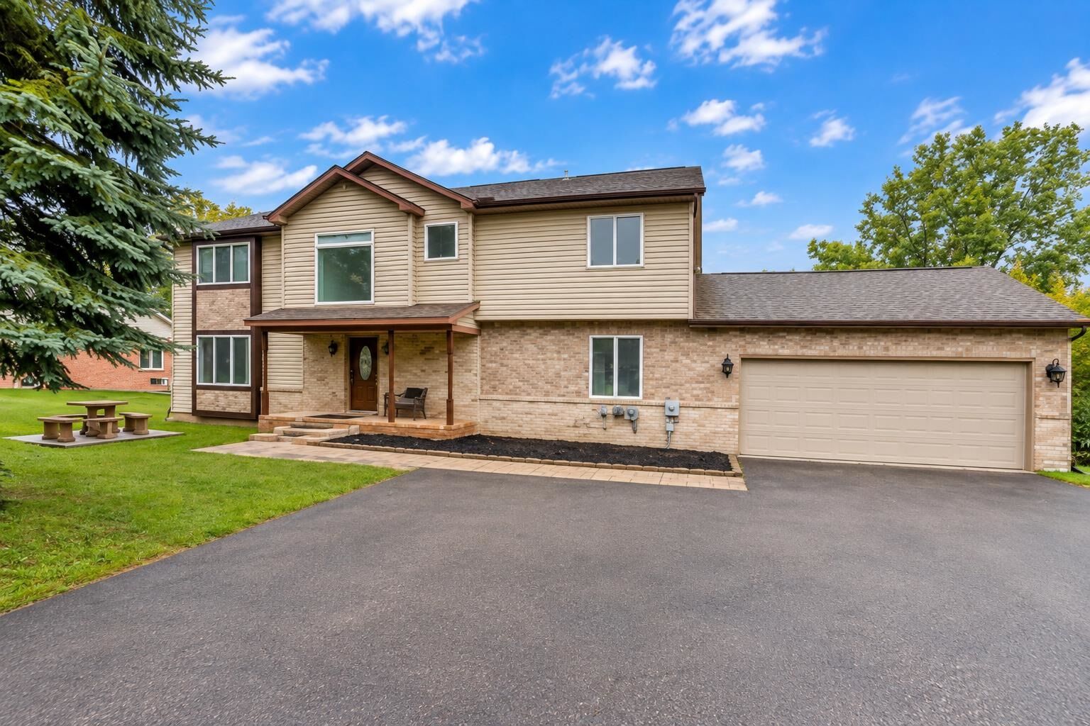 Property Photo:  7295 W Maple Road  MI 48322-2706 