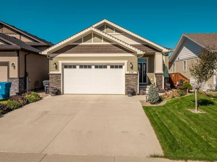 Property Photo:  324 Rivergrove Chase W  AB T1K 8E8 