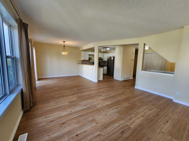 Property Photo:  717 Harvest Hills Drive NE  AB T3K 4R3 