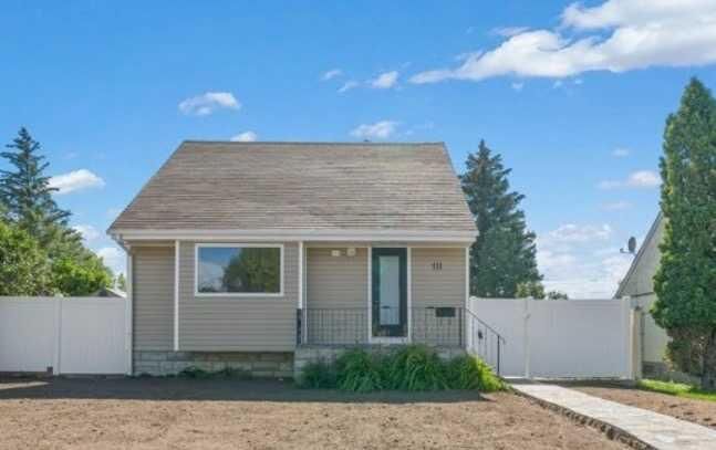 Property Photo:  111 10 Street SW  AB T1A 4R1 