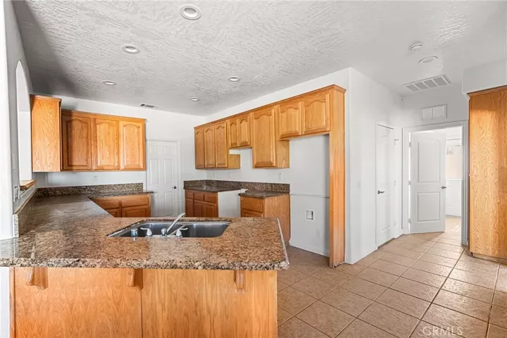 Property Photo: 8778 Smoke Tree CA 92371