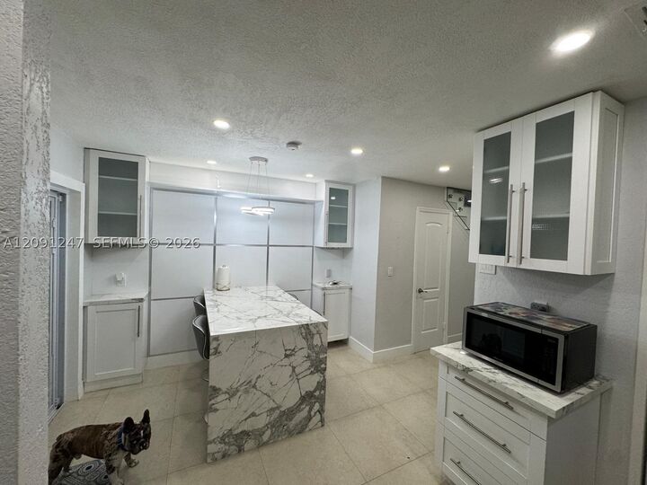 Property Photo: 1305 W 53rd St 102 FL 33012