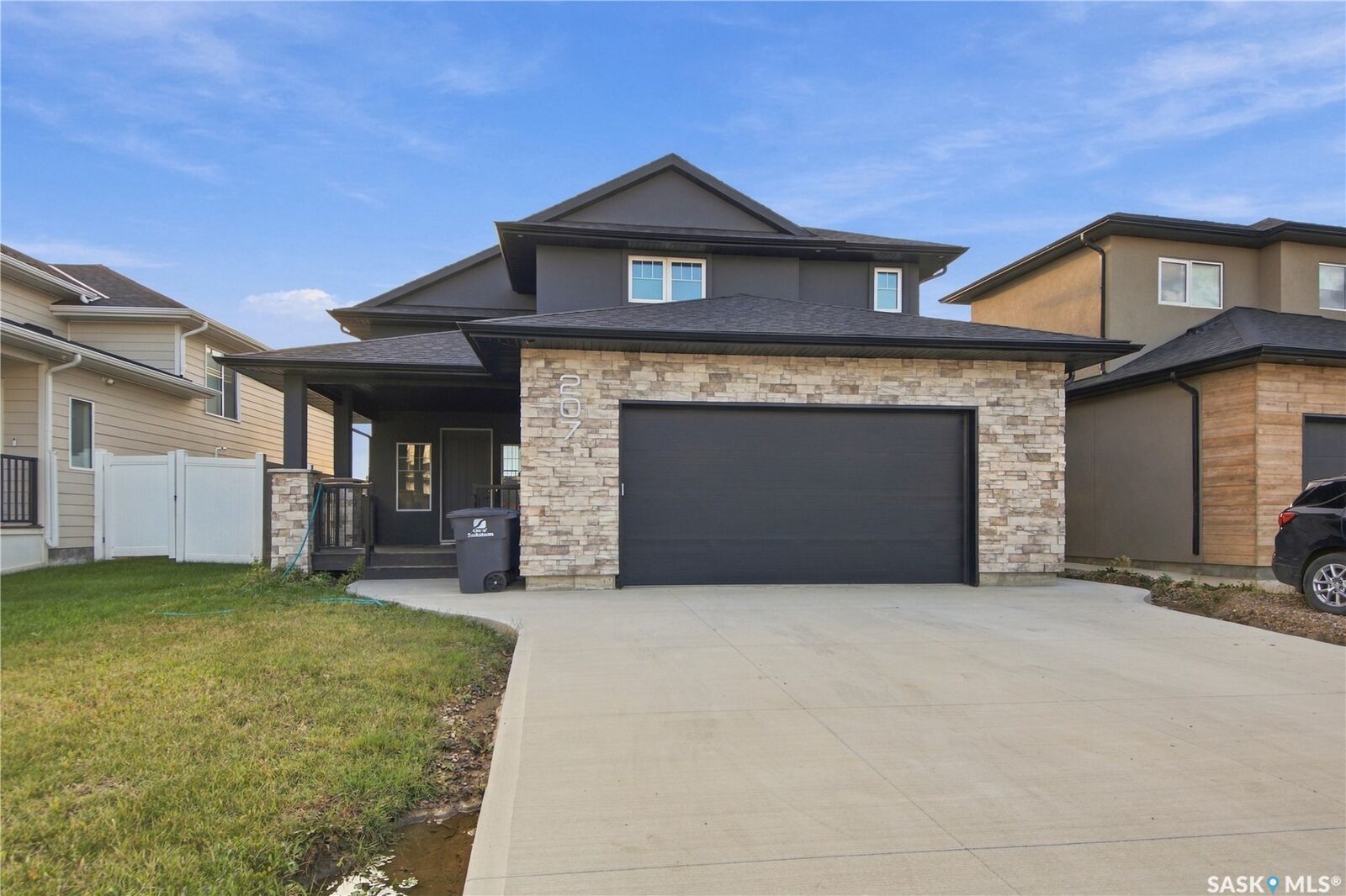 Property Photo:  207 Greyeyes-Steele Way  SK S7V 0M6 