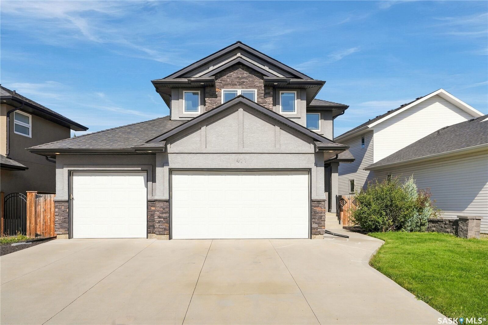 Property Photo:  411 Hastings Crescent  SK S7V 0C7 