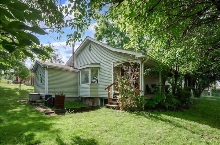 Property Photo:  411 Harmony Rd  PA 15005 