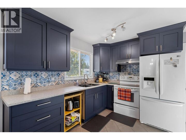 Property Photo:  3918 Enemark Crescent  BC V2N 2X5 