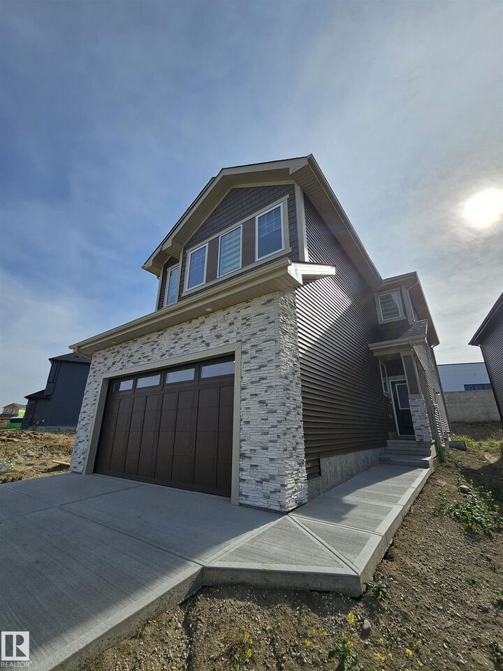Property Photo: 1407 Osprey Court NW AB T5M 0M2
