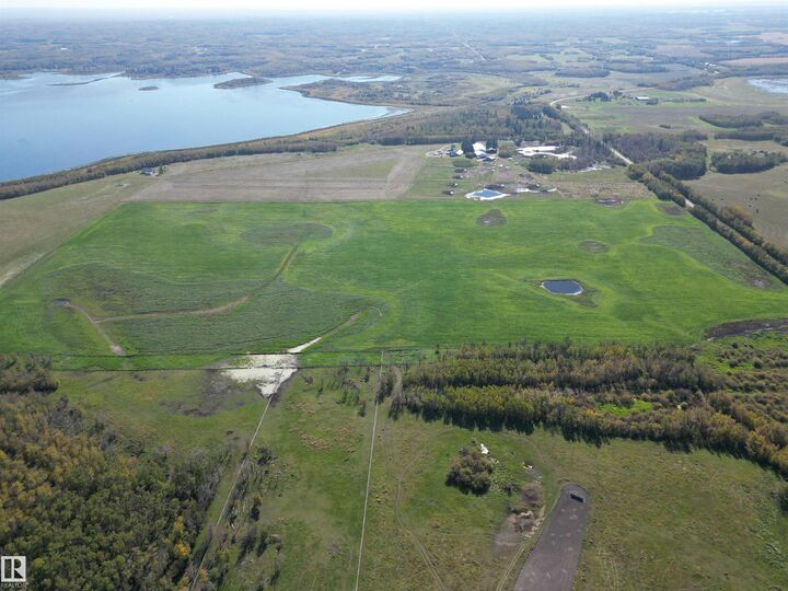 Property Photo:  SE Corner Twp Rd 514 & RR 210  AB T8G 1G3 
