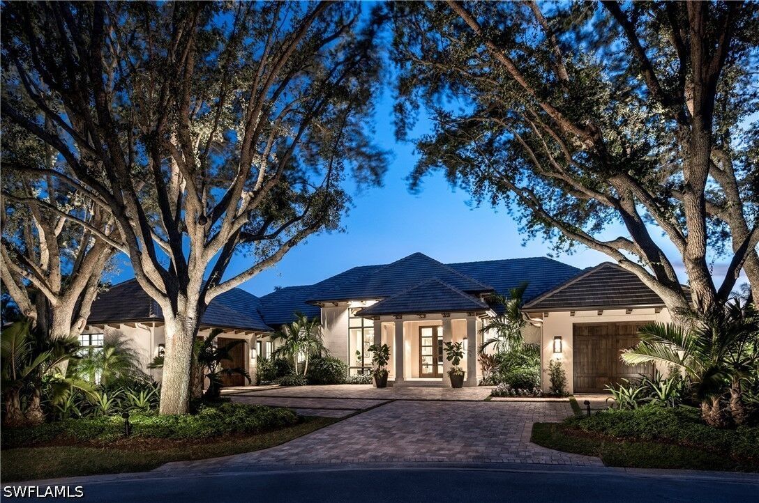 Property Photo:  702 Tamarind Court  FL 34108 