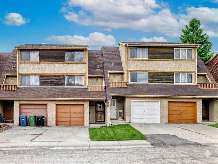 Property Photo: 6909 Ranchero Road NW AB T3G 1J6