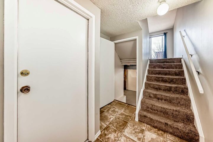 Property Photo: 6909 Ranchero Road NW AB T3G 1J6