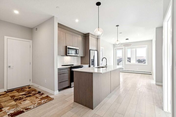 Property Photo:  111 Wolf Creek Drive SE 1305  AB T2X 5X2 