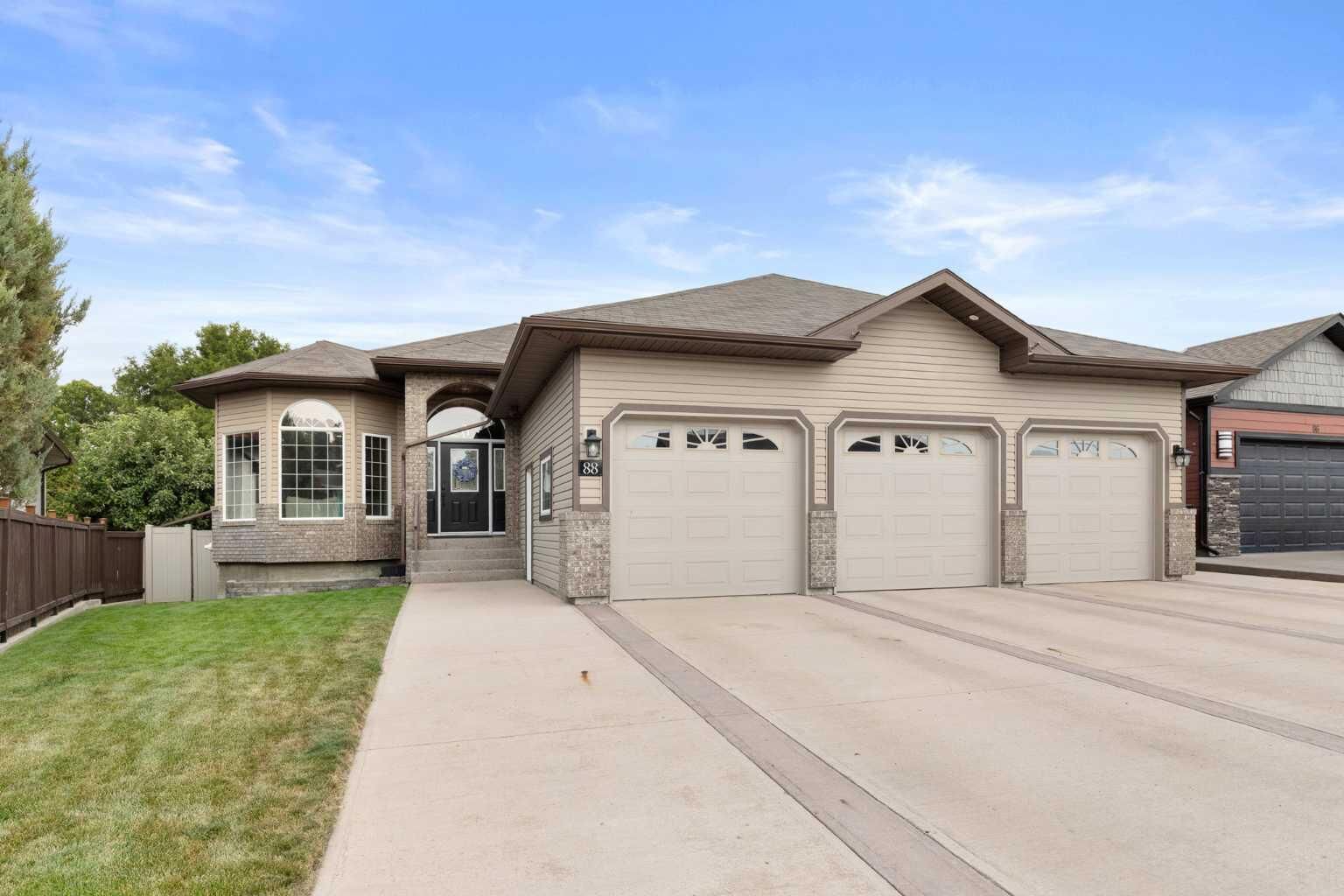 Property Photo:  88 Greenwood Court SW  AB T1A 7X7 