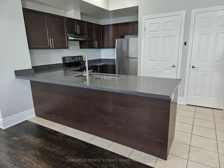 Property Photo:  2420 Baronwood Drive 28-04  ON L6M 0J7 