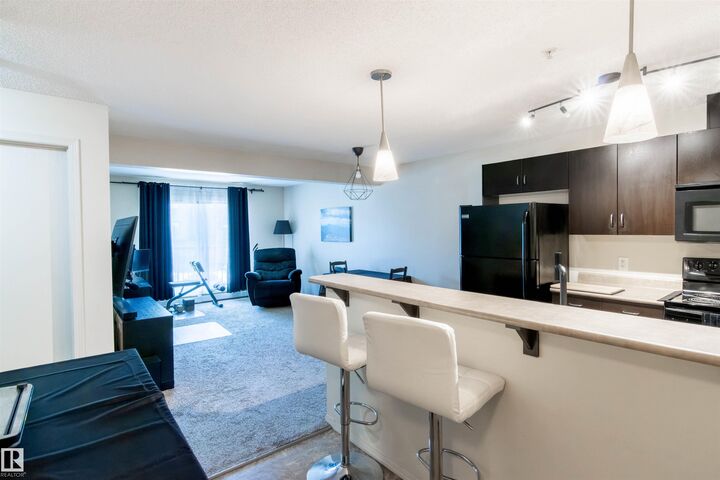 Property Photo:  1188 Hyndman Road NW 214  AB T5A 0E9 