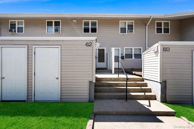 Property Photo: 62 Townhouse Road N 62 NY 11746