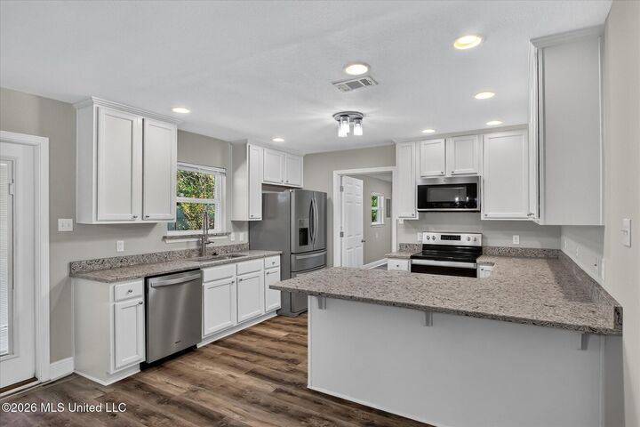 Property Photo:  15396 Mimosa Drive  MS 39503 