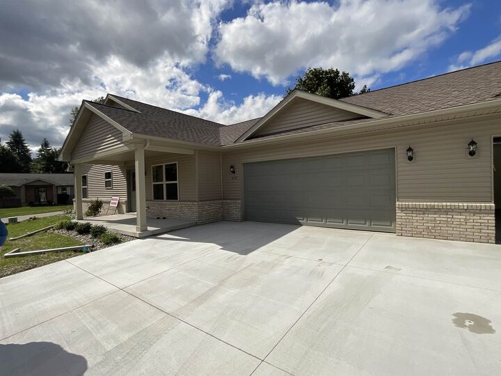 Property Photo:  619 Kemp Court  MI 48624 