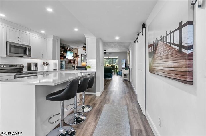 Property Photo: 7320 Province Way 2105 FL 34104