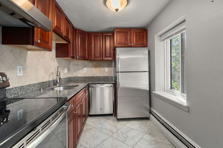 Property Photo:  133 Beaconsfield 44  MA 02445 