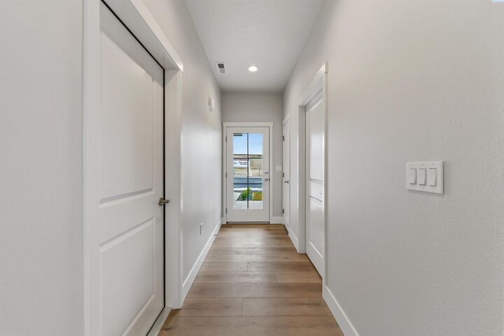 Property Photo:  703 Honeylicious St  WA 99352 