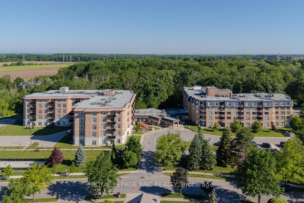 Property Photo:  8111 Forest Glen Drive 220  ON L2H 2Y7 
