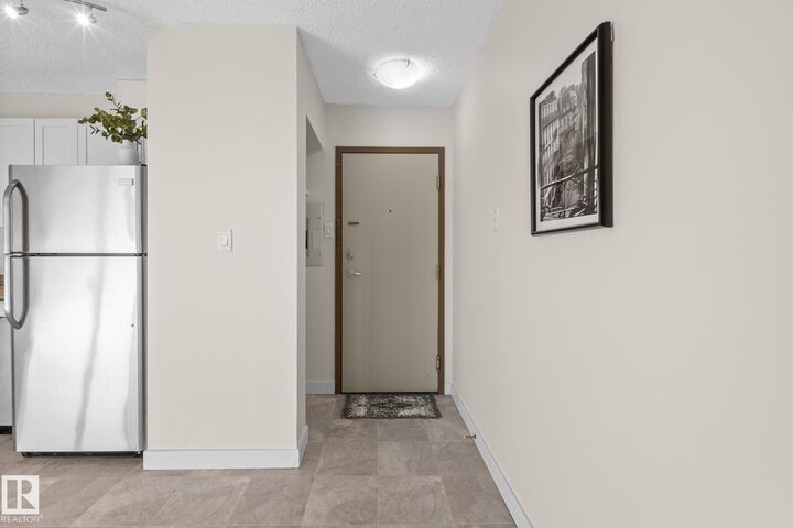 Property Photo:  9710 105 Street NW 1210  AB T5K 1A4 