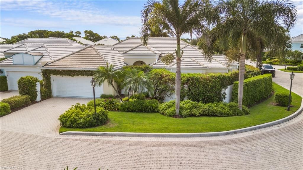 Property Photo:  807 Rue Deville 2.11  FL 34108 