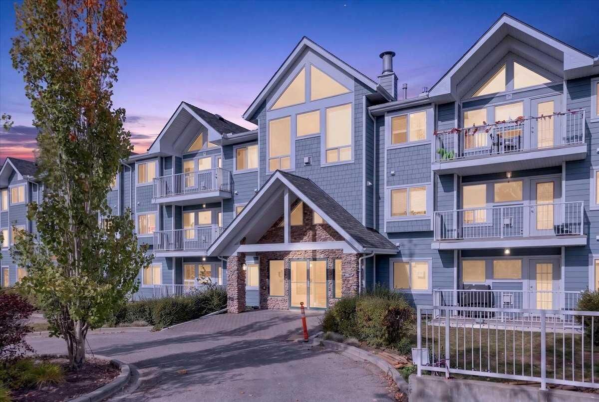 Property Photo: 7 Harvest Gold Manor NE 212 AB T3K 4Y3
