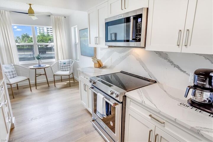 Property Photo:  513 Club Side Dr 1-513  FL 34110 